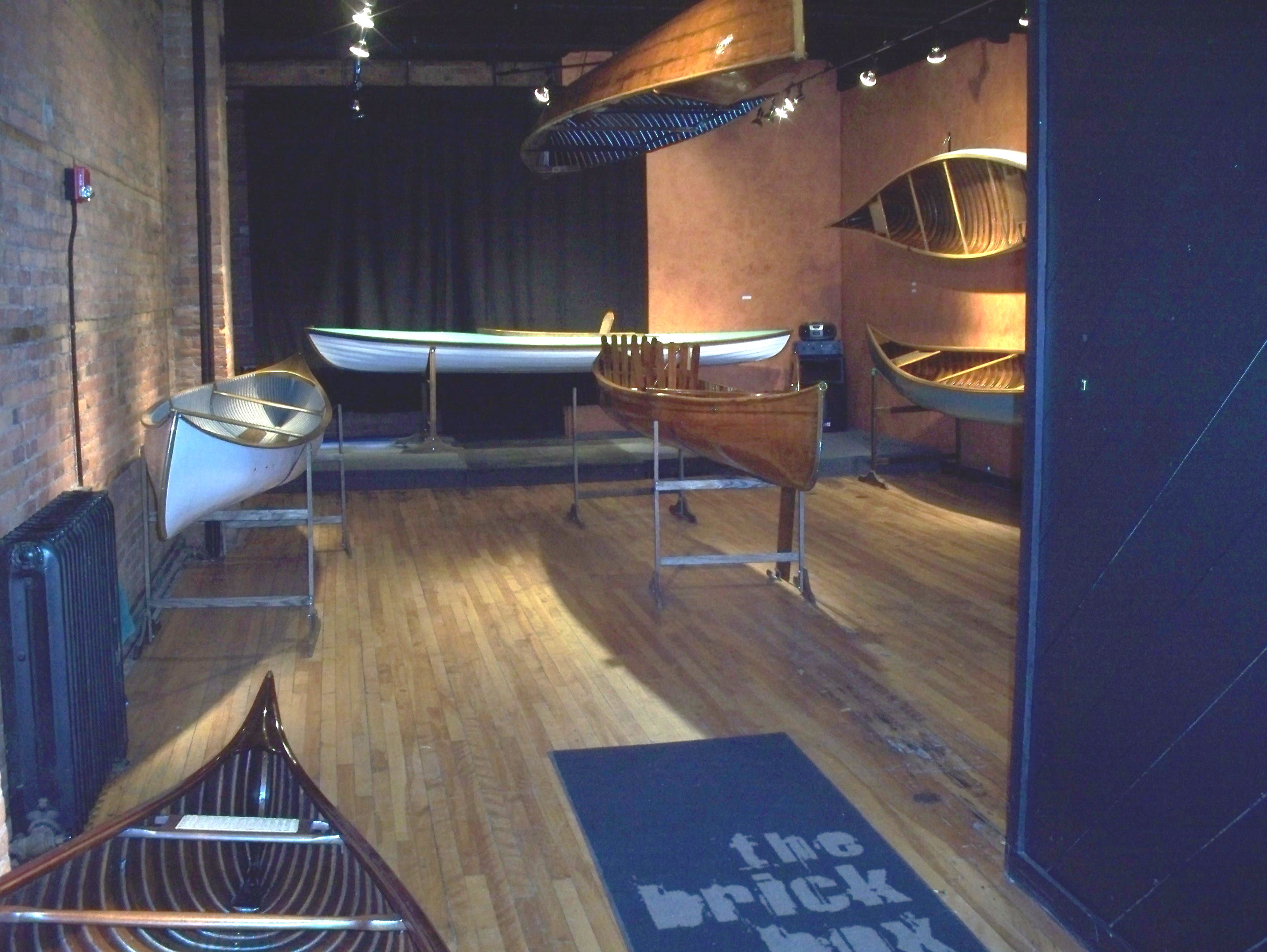 Canoes as Art Several of my restorations on display in an art gallery.